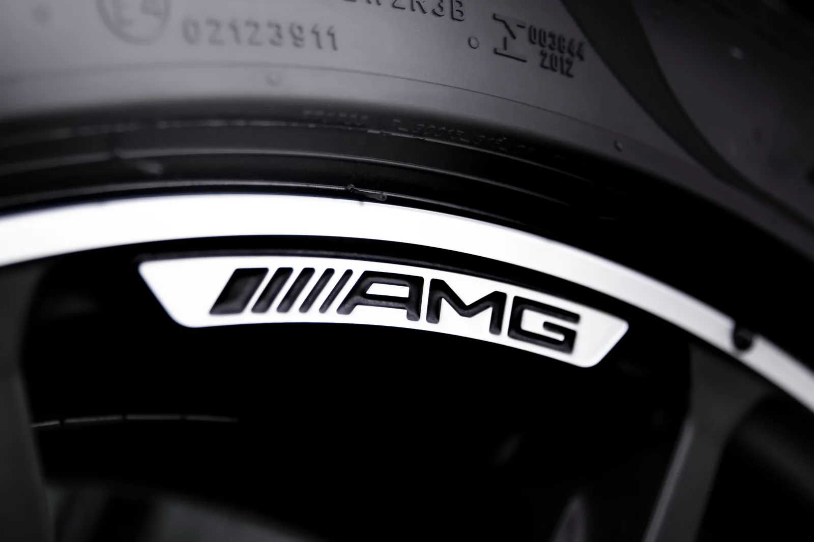 AMG lettering on the black alloy wheel rim