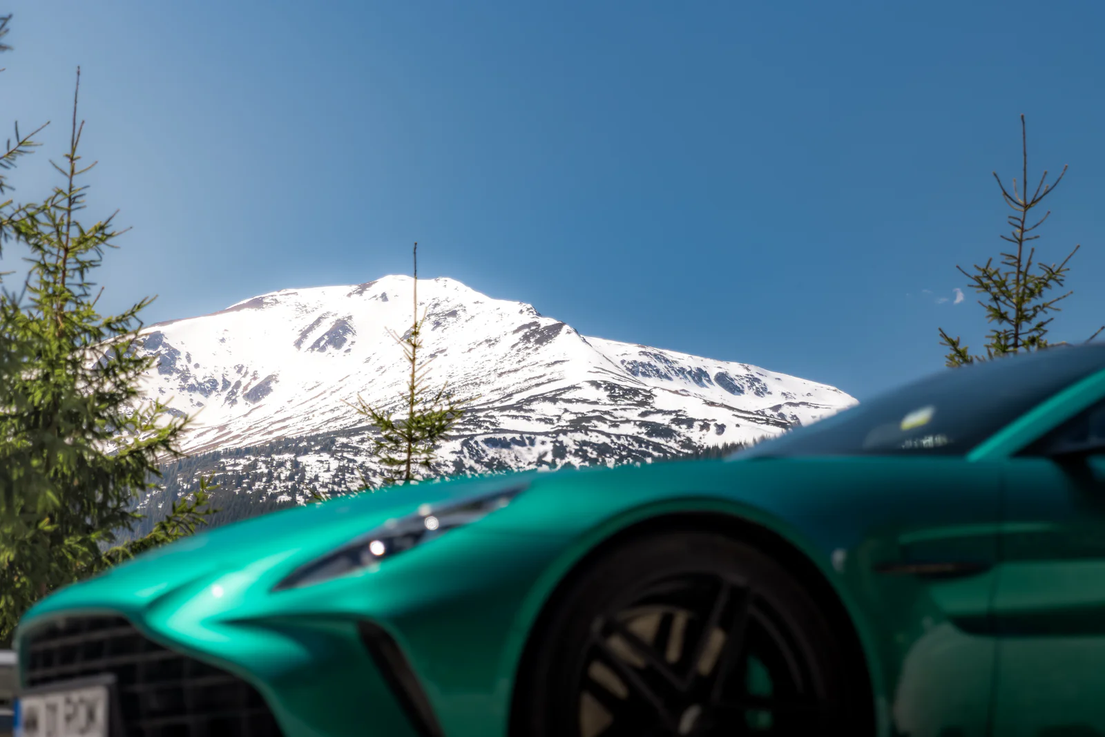 Snowy mountain in focus beyond the softly rendered front of the Vantage