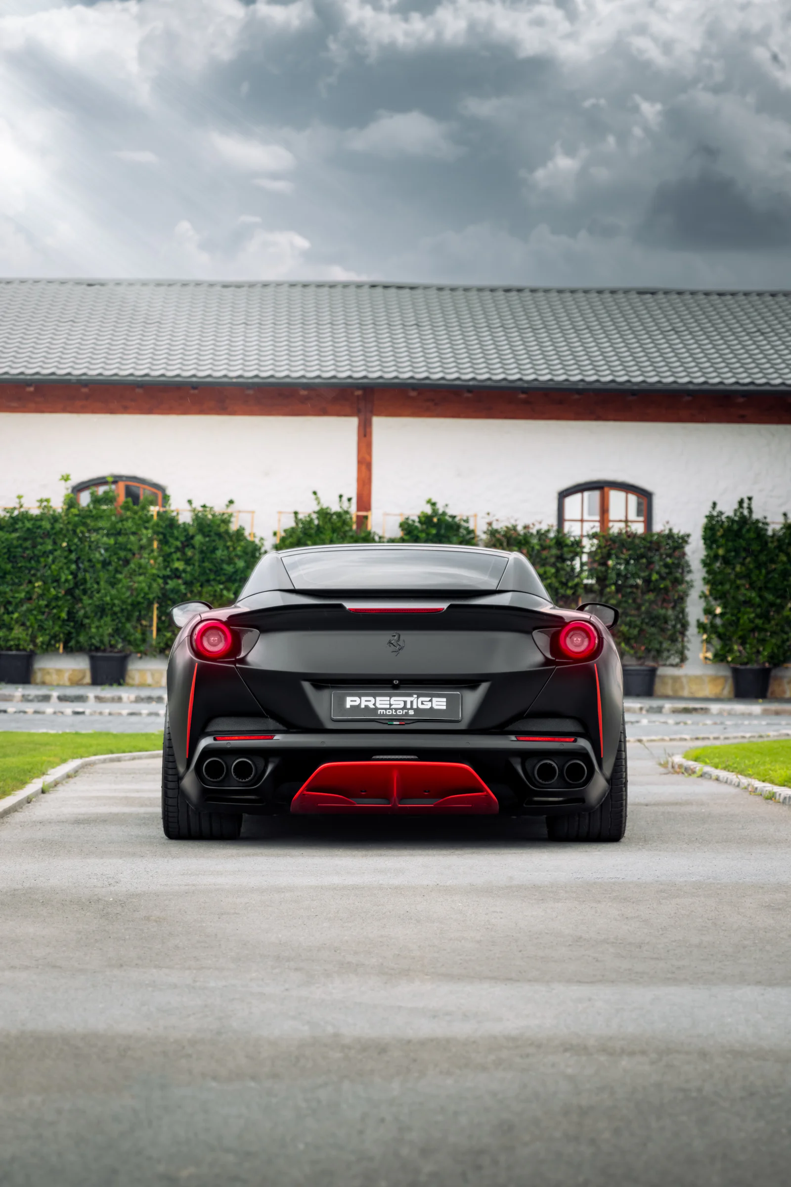 Rear view of the Portofino with circular red taillights and a red diffuser